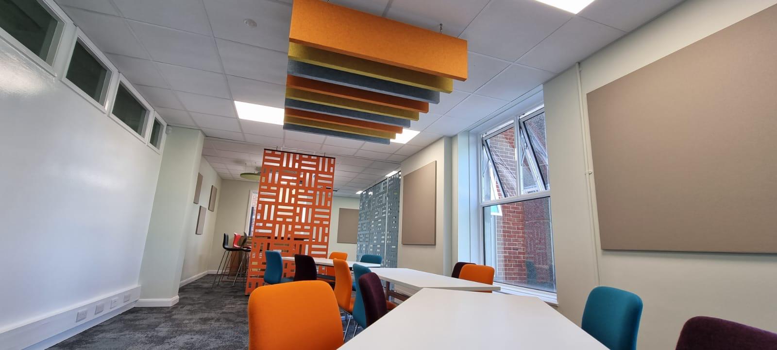 Acoustic ceiling panels in a school classroom